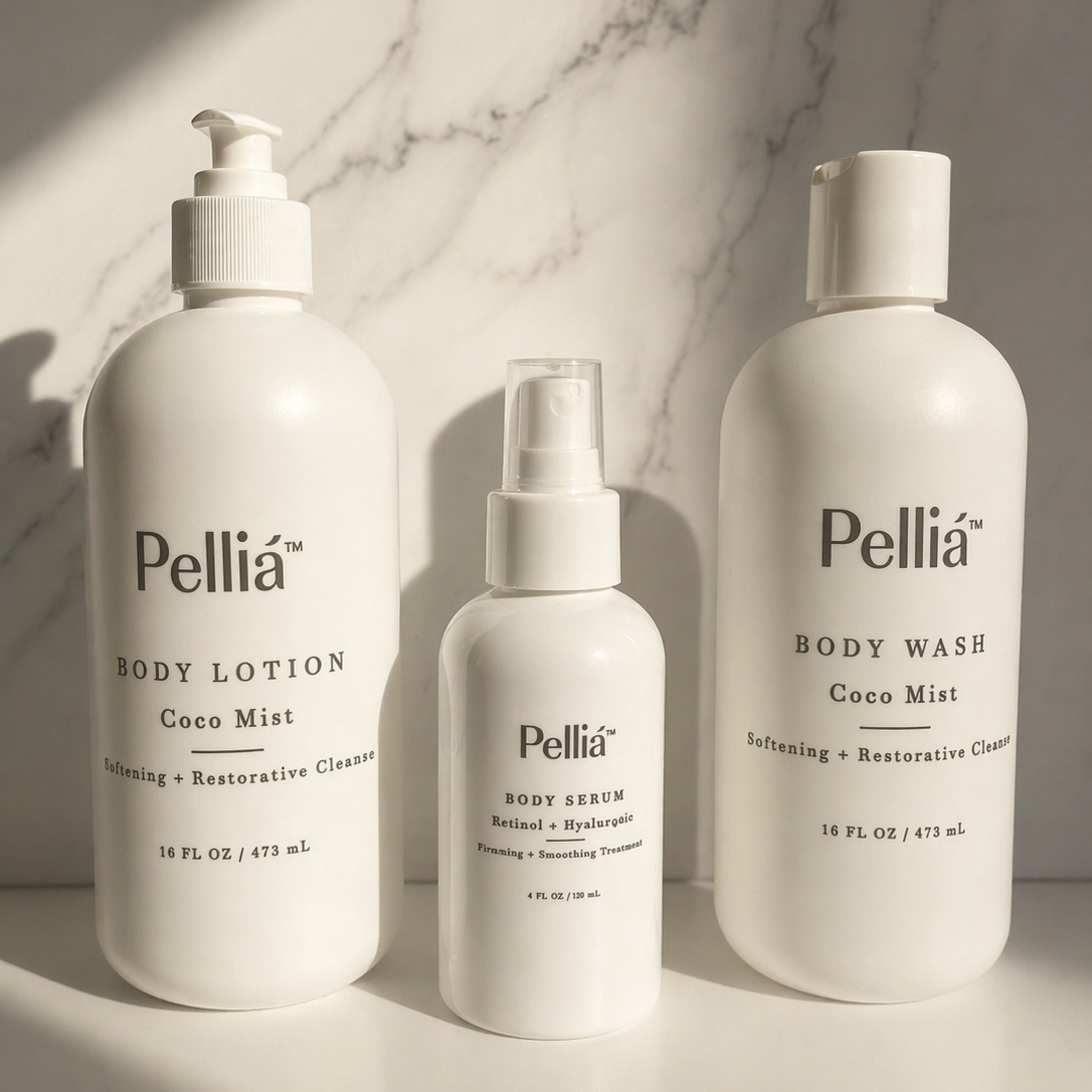 Pellia skincare products including body lotion, body wash, and body serum on a marble background