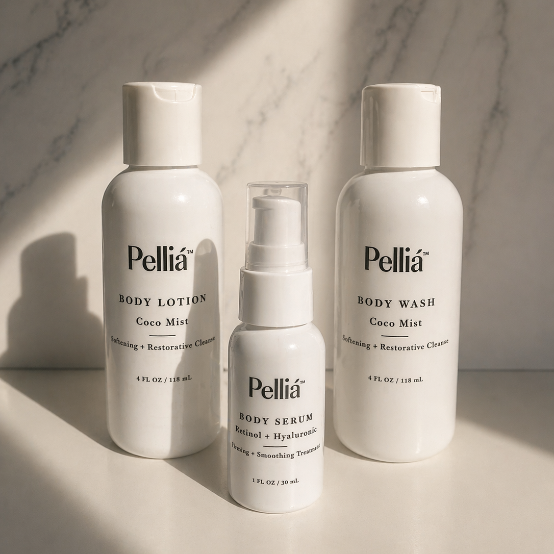 Pellia skincare products including body lotion, body wash, and serum on a marble surface.